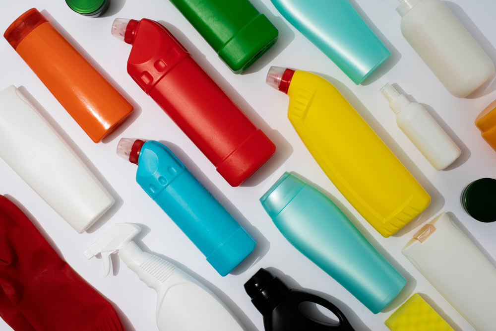 Assorted colorful plastic bottles and containers made from Iran HDPE, showcasing durable and versatile packaging solutions for various industries.