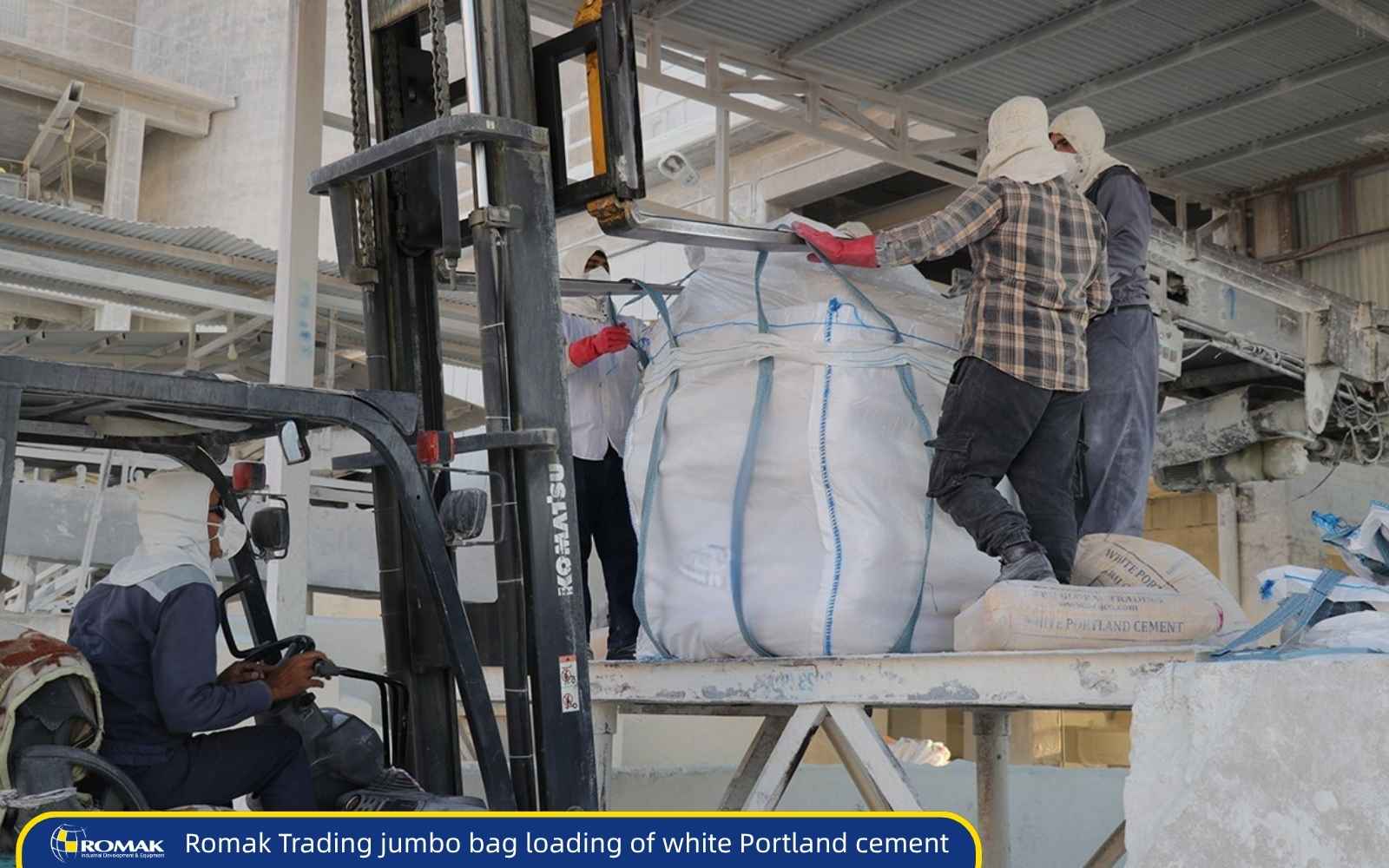 Romak Trading workers loading white cement jumbo bags with forklift at packaging facility in Iran
